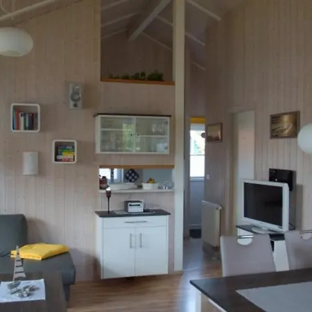 6 Personen Kinderfreundliches Mit Sauna, Whirlpool Und Kaminofen In Сasa de vacaciones Otterndorf